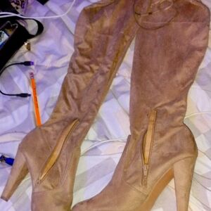 Knee length high heel boots